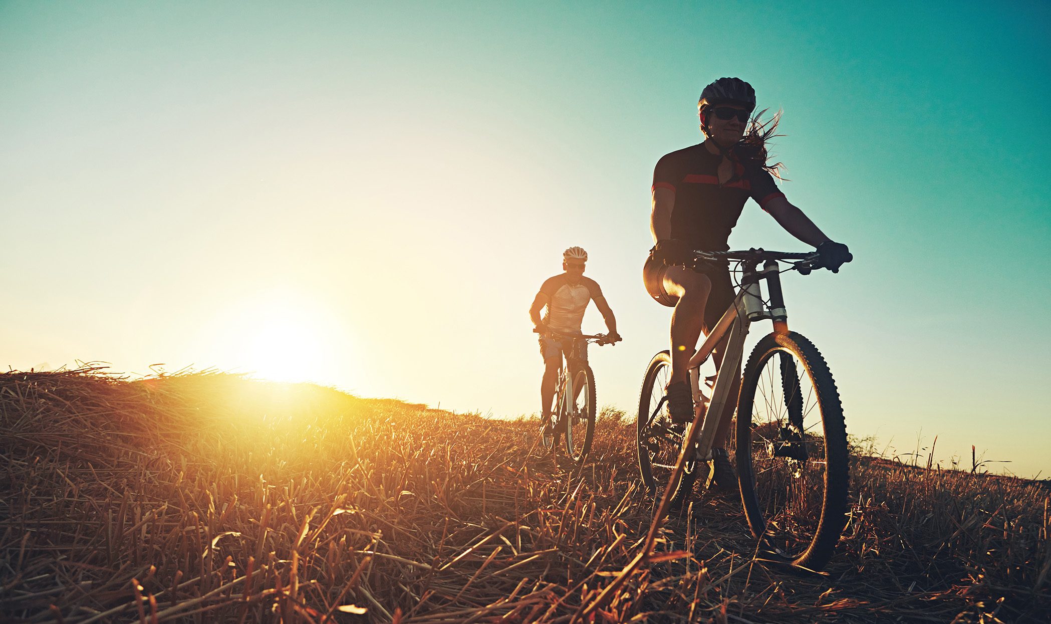 Sunset,Sky,,People,And,Friends,On,Bicycle,With,Exercise,,Race